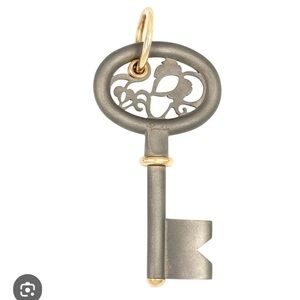Pomellato necklace pendant titanium rose gold key